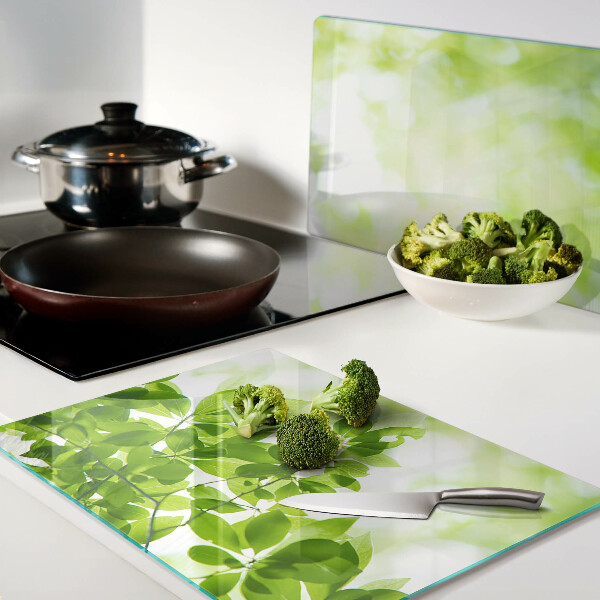 Szklana deska do krojenia z motywem zielonych liści o jasnym podświetleniu