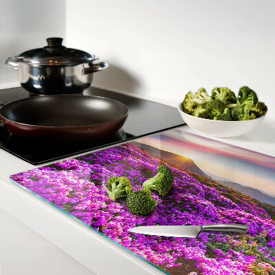 Deska kuchenna szklana z motywem kwiatowego krajobrazu o zachodzie słońca