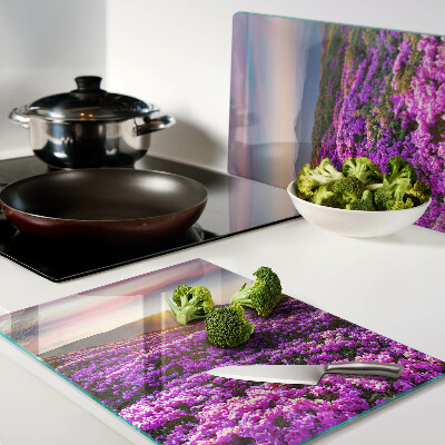 Deska kuchenna szklana z motywem kwiatowego krajobrazu o zachodzie słońca