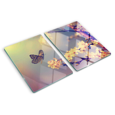 Szklana deska kuchenna z motywem motyla na tle kwiatów