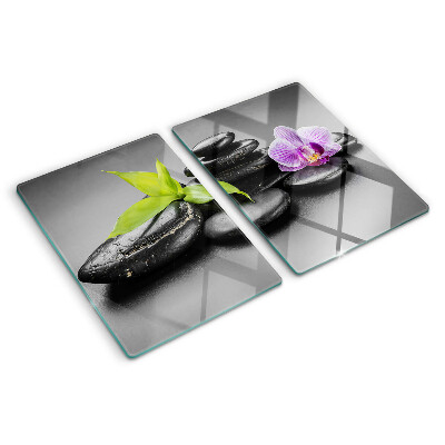 Deska kuchenna szklana z motywem kamieni i orchidei na tle