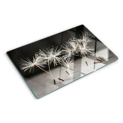 Szklana deska kuchenna z motywem puszystych dmuchawców na monochromatycznym tle