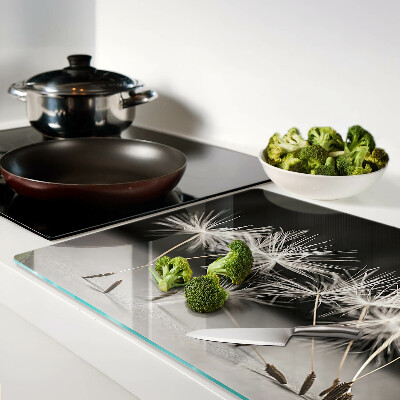 Szklana deska kuchenna z motywem puszystych dmuchawców na monochromatycznym tle