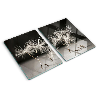 Szklana deska kuchenna z motywem puszystych dmuchawców na monochromatycznym tle