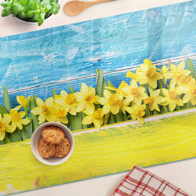 Szklana deska kuchenna z motywem żonkili na tle nieba