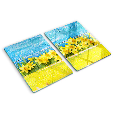 Szklana deska kuchenna z motywem żonkili na tle nieba