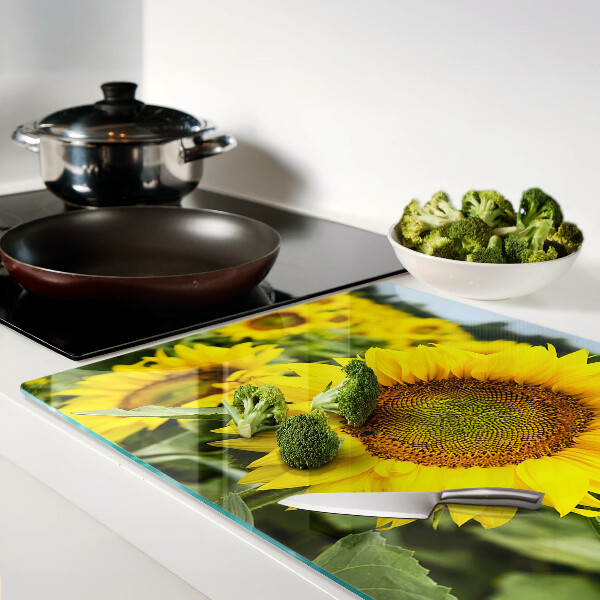 Deska kuchenna szklana z motywem słoneczników na tle zieleni