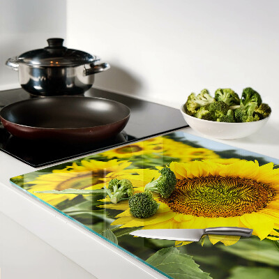 Deska kuchenna szklana z motywem słoneczników na tle zieleni