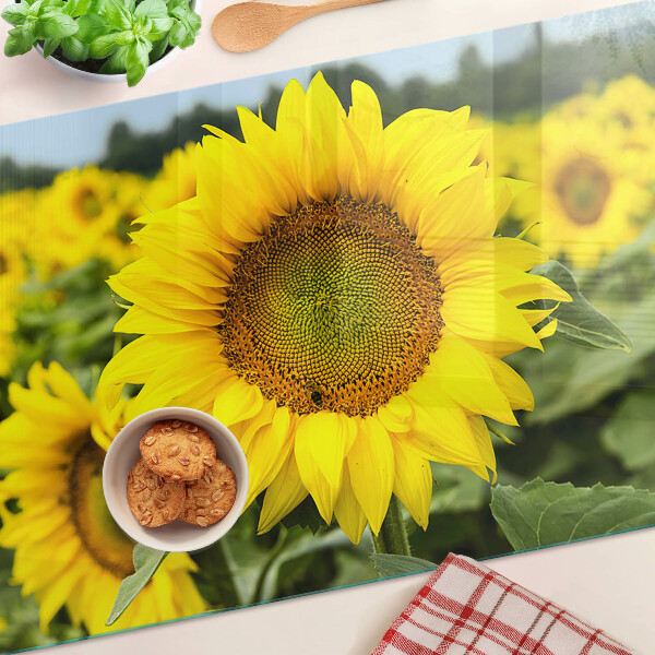 Deska kuchenna szklana z motywem słoneczników na tle zieleni