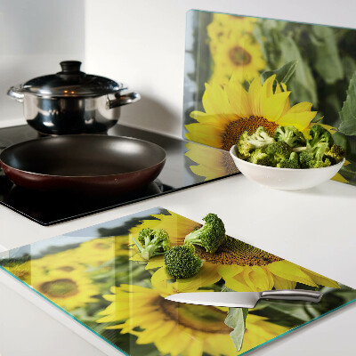 Deska kuchenna szklana z motywem słoneczników na tle zieleni