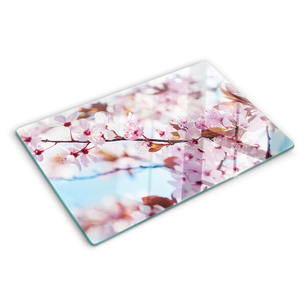 Deska kuchenna szklana z motywem kwiatów wiśni na niebieskim tle
