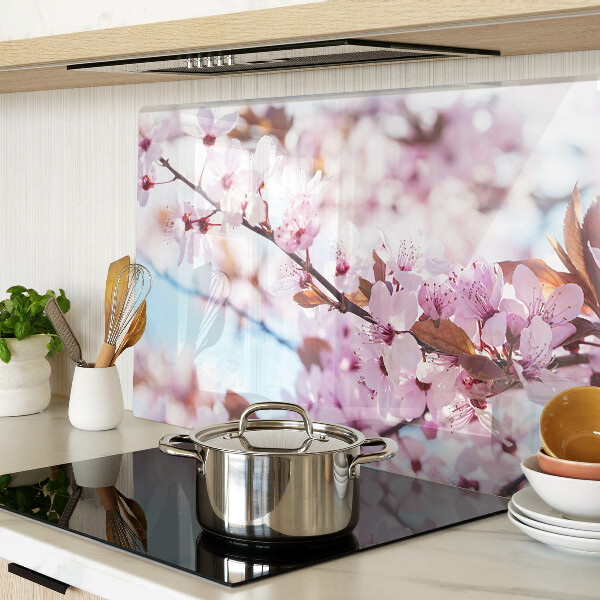 Deska kuchenna szklana z motywem kwiatów wiśni na niebieskim tle