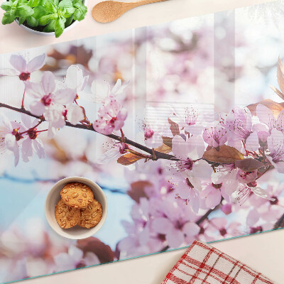 Deska kuchenna szklana z motywem kwiatów wiśni na niebieskim tle