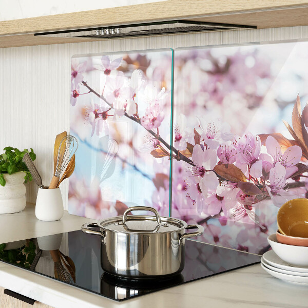 Deska kuchenna szklana z motywem kwiatów wiśni na niebieskim tle