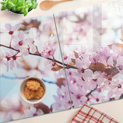 Deska kuchenna szklana z motywem kwiatów wiśni na niebieskim tle