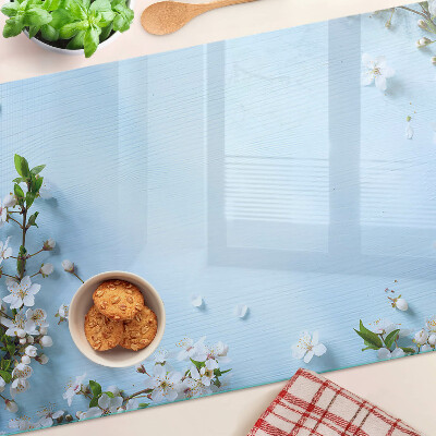 Szklana deska do krojenia z kwiatowym wzorem na niebieskim tle