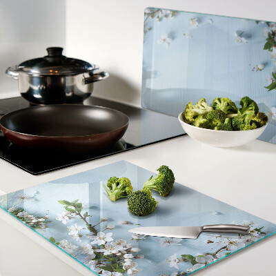 Szklana deska do krojenia z kwiatowym wzorem na niebieskim tle