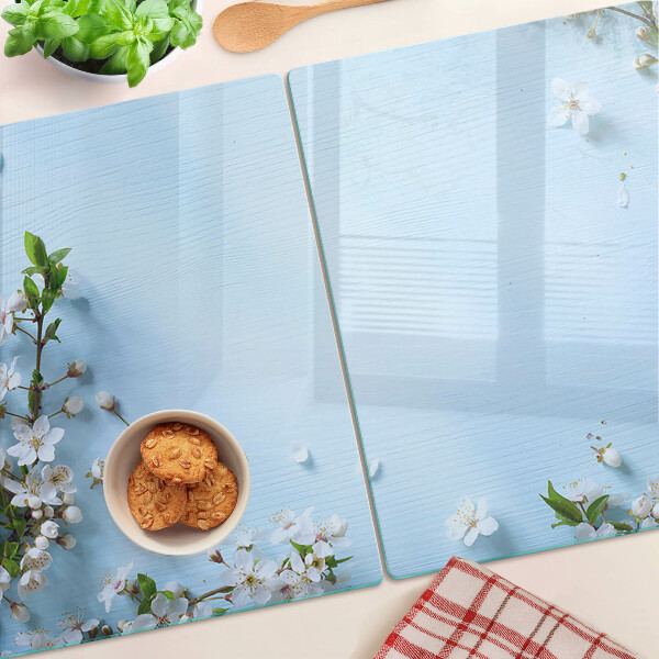 Szklana deska do krojenia z kwiatowym wzorem na niebieskim tle