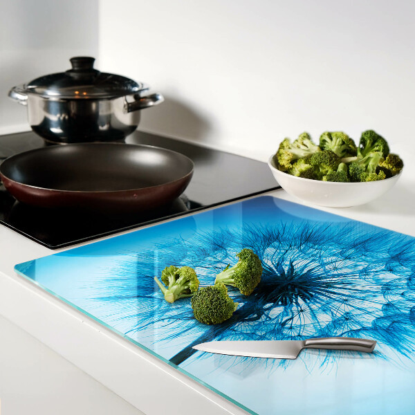 Szklana deska kuchenna z nadrukiem dmuchawca na niebieskim tle