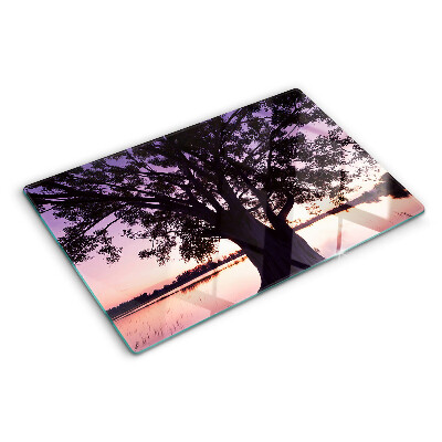 Szklana deska do krojenia z nadrukiem przedstawiającym drzewo przy zachodzie słońca