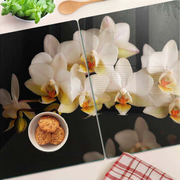 Deska kuchenna szklana z motywem orchidei na czarnym tle