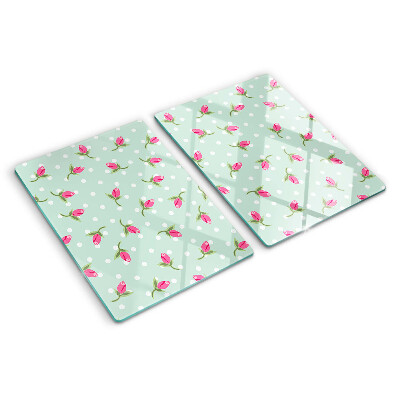 Szklana deska kuchenna z różowymi tulipanami na zielonym tle