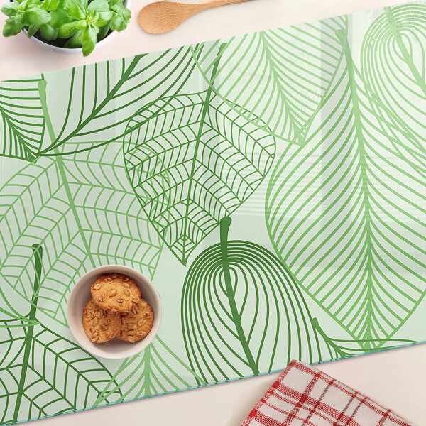 Szklana deska do krojenia z motywem liści w odcieniach zieleni