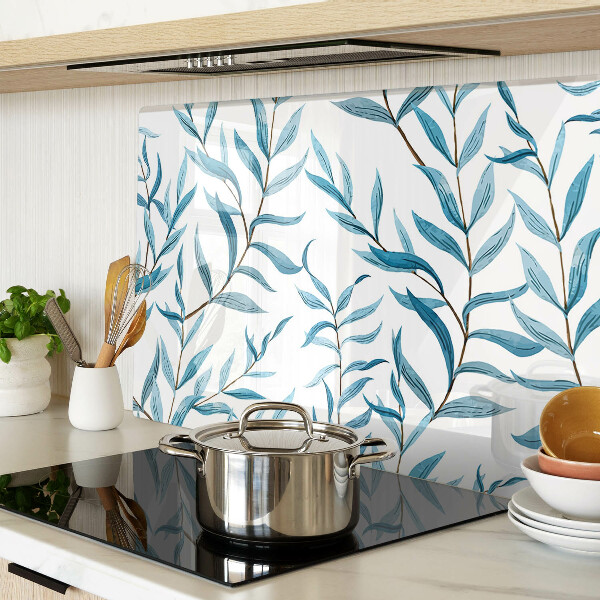 Szklana deska kuchenna z motywem liści w odcieniach niebieskiego