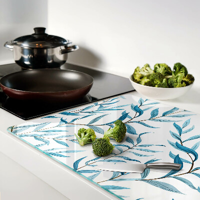 Szklana deska kuchenna z motywem liści w odcieniach niebieskiego