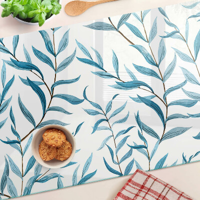 Szklana deska kuchenna z motywem liści w odcieniach niebieskiego