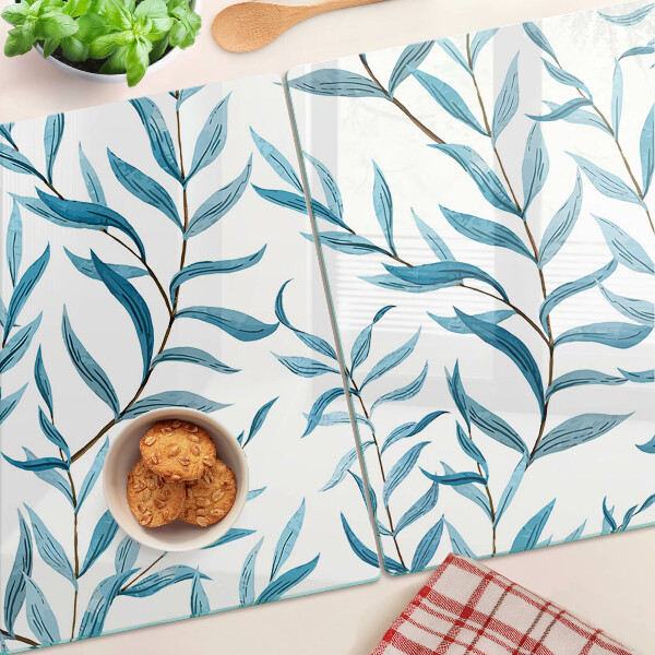 Szklana deska kuchenna z motywem liści w odcieniach niebieskiego