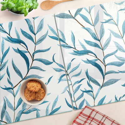 Szklana deska kuchenna z motywem liści w odcieniach niebieskiego