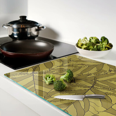 Szklana deska do krojenia z motywem liści w odcieniach złota