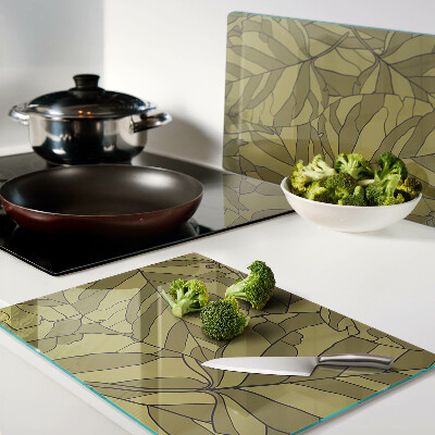 Szklana deska do krojenia z motywem liści w odcieniach złota