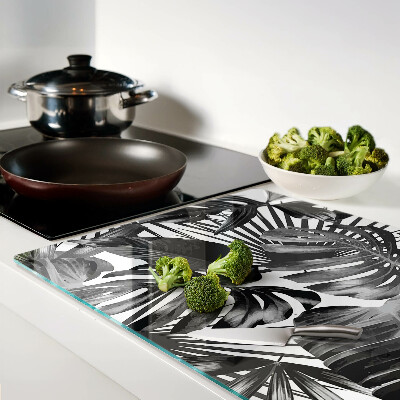 Szklana deska kuchenna z motywem tropikalnych liści w czerni i bieli