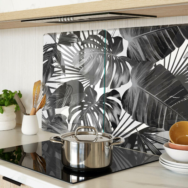 Szklana deska kuchenna z motywem tropikalnych liści w czerni i bieli