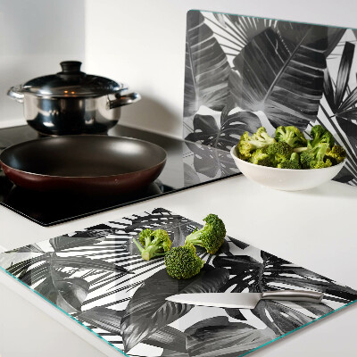 Szklana deska kuchenna z motywem tropikalnych liści w czerni i bieli