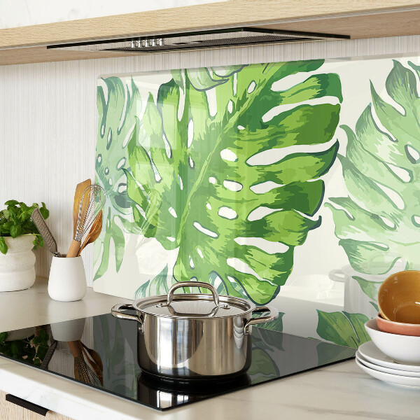 Deska kuchenna szklana z motywem liści monstery na jasnym tle