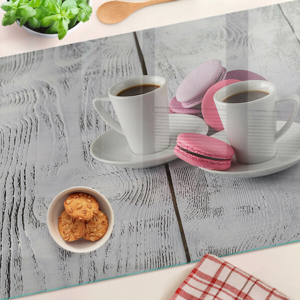 Szklana deska kuchenna Kawa i makaroniki na tle drewna