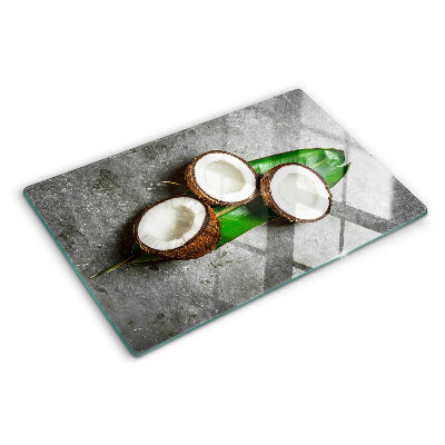 Deska kuchenna szklana z motywem kokosa na tle betonu