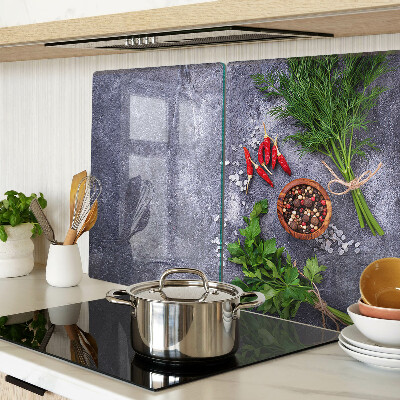 Deska kuchenna szklana z motywem ziół i przypraw na tle kamienia
