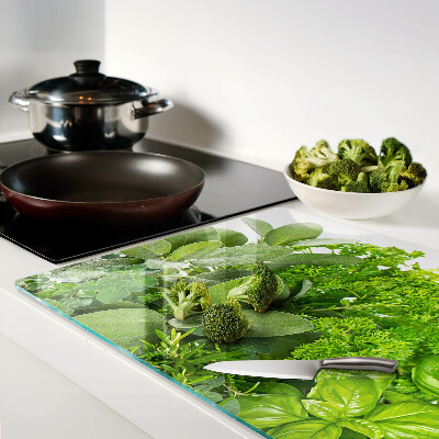 Szklana deska kuchenna z motywem zielonych ziół i liści