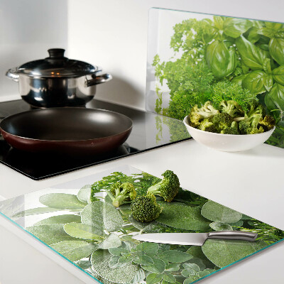 Szklana deska kuchenna z motywem zielonych ziół i liści