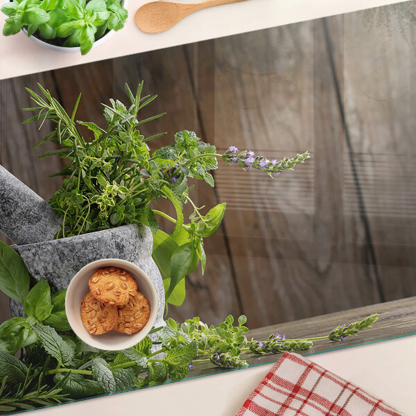 Szklana deska kuchenna z motywem ziół w doniczce