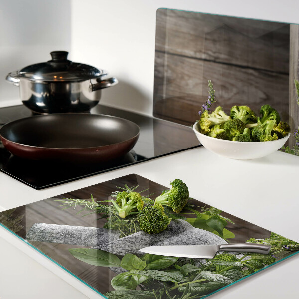 Szklana deska kuchenna z motywem ziół w doniczce