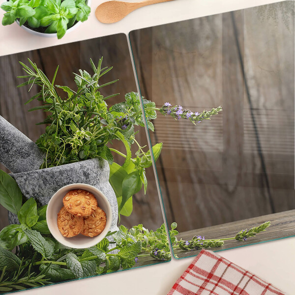 Szklana deska kuchenna z motywem ziół w doniczce
