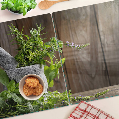 Szklana deska kuchenna z motywem ziół w doniczce