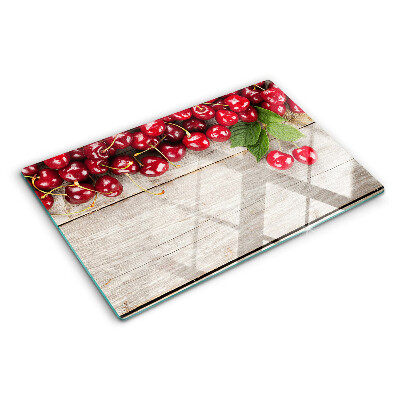 Szklana deska kuchenna z motywem wiśni na drewnianym tle