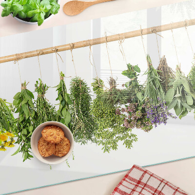 Szklana deska do krojenia z motywem suszonych ziół na sznurku