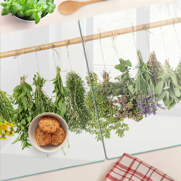 Szklana deska do krojenia z motywem suszonych ziół na sznurku